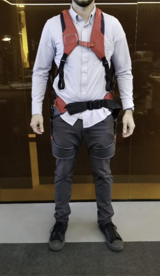 ExoSuit passive exoskeleton worn — fit and load path in use